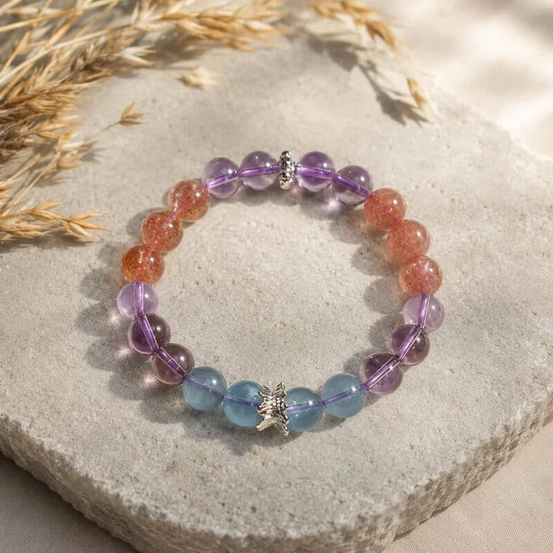 AURA Amulet Strawberry Quartz Amethyst Aquamarine bracelet on rough stone for love and attraction.