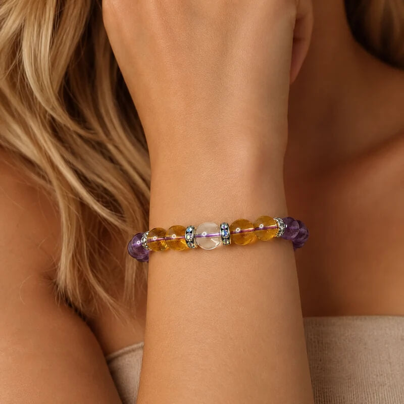 Natural amethyst crystal bracelet worn on a woman's wrist, showcasing the perfect fit for daily healing rituals.