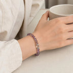 Elegant amethyst crystal bracelet for women worn on wrist, perfect for natural crystal healing.