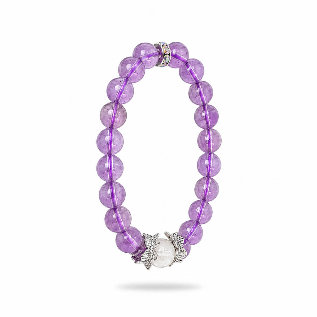 AURA Amulet amethyst crystal bracelet angled view highlighting the clear quartz and angel wings. 