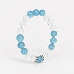Aquamarine and clear quartz crystal bracelet shown upright at a 45 degree angl