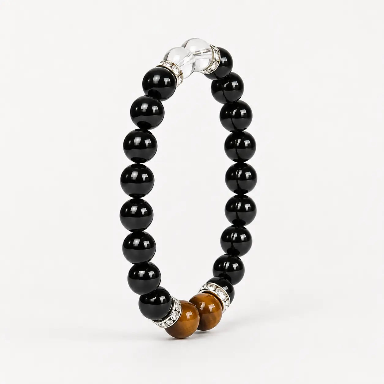 AURA Amulet black obsidian bracelet for women angled on white background, ideal for grounding and shielding. 