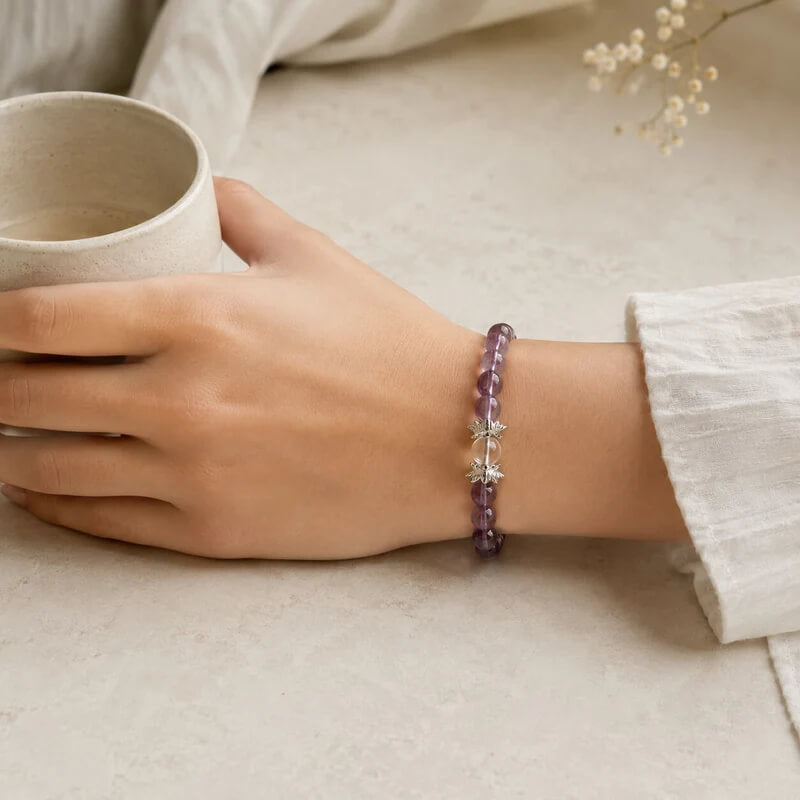 AURA Amulet healing crystal bracelet for women styled in a cozy setting, great for stress relief.