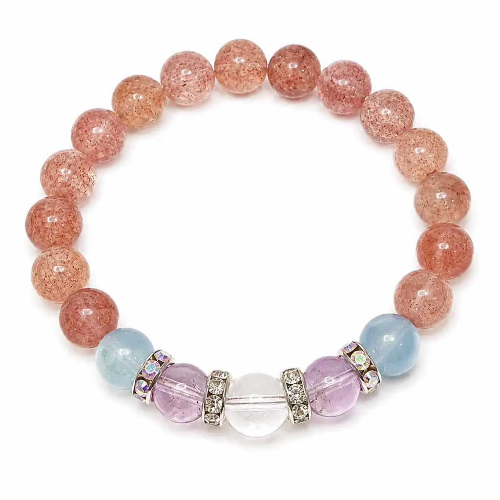 Round strawberry quartz bracelet with pale blue aquamarine, lavender amethyst and clear quartz on white