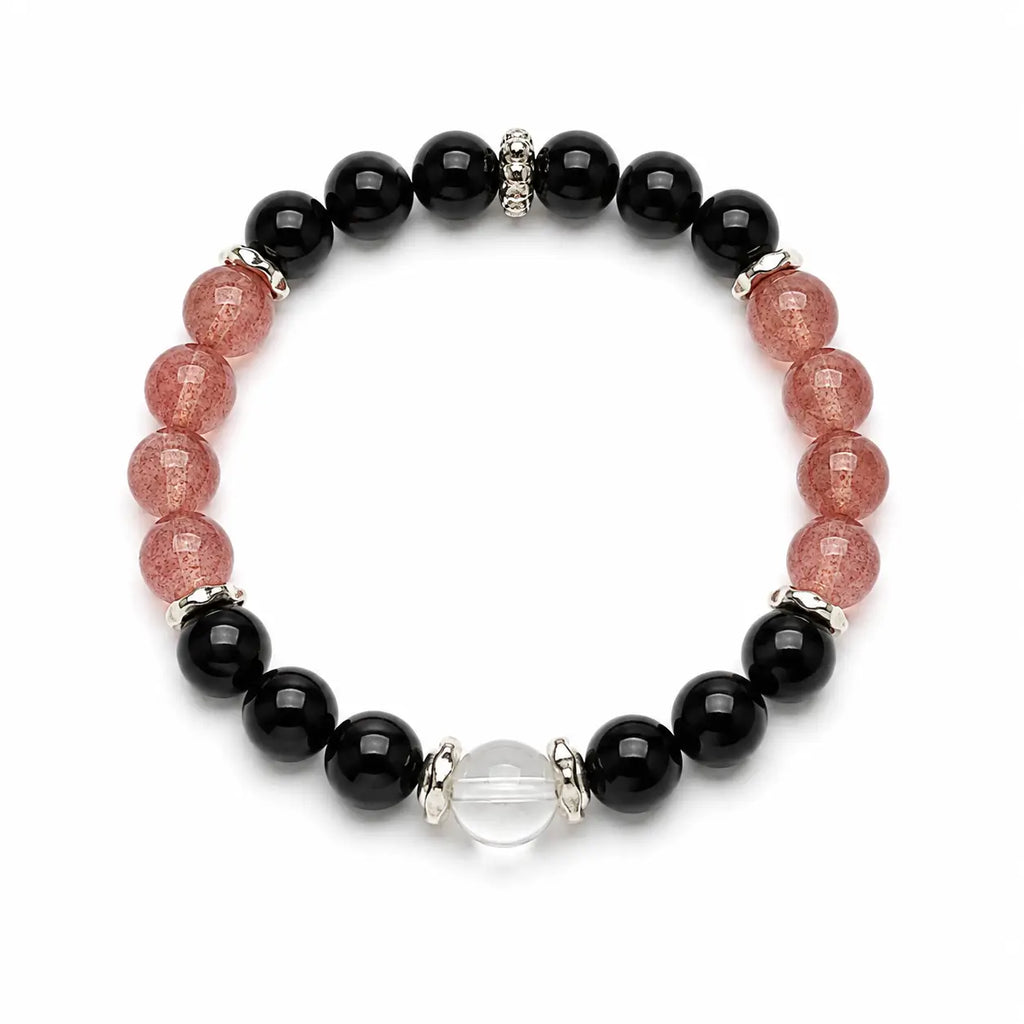 AURA Amulet protection bracelets for women with obsidian and strawberry quartz beads laid flat on white. 