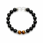 AURA Amulet obsidian bracelet for protection with tiger's eye and quartz beads, laid flat for product clarity.