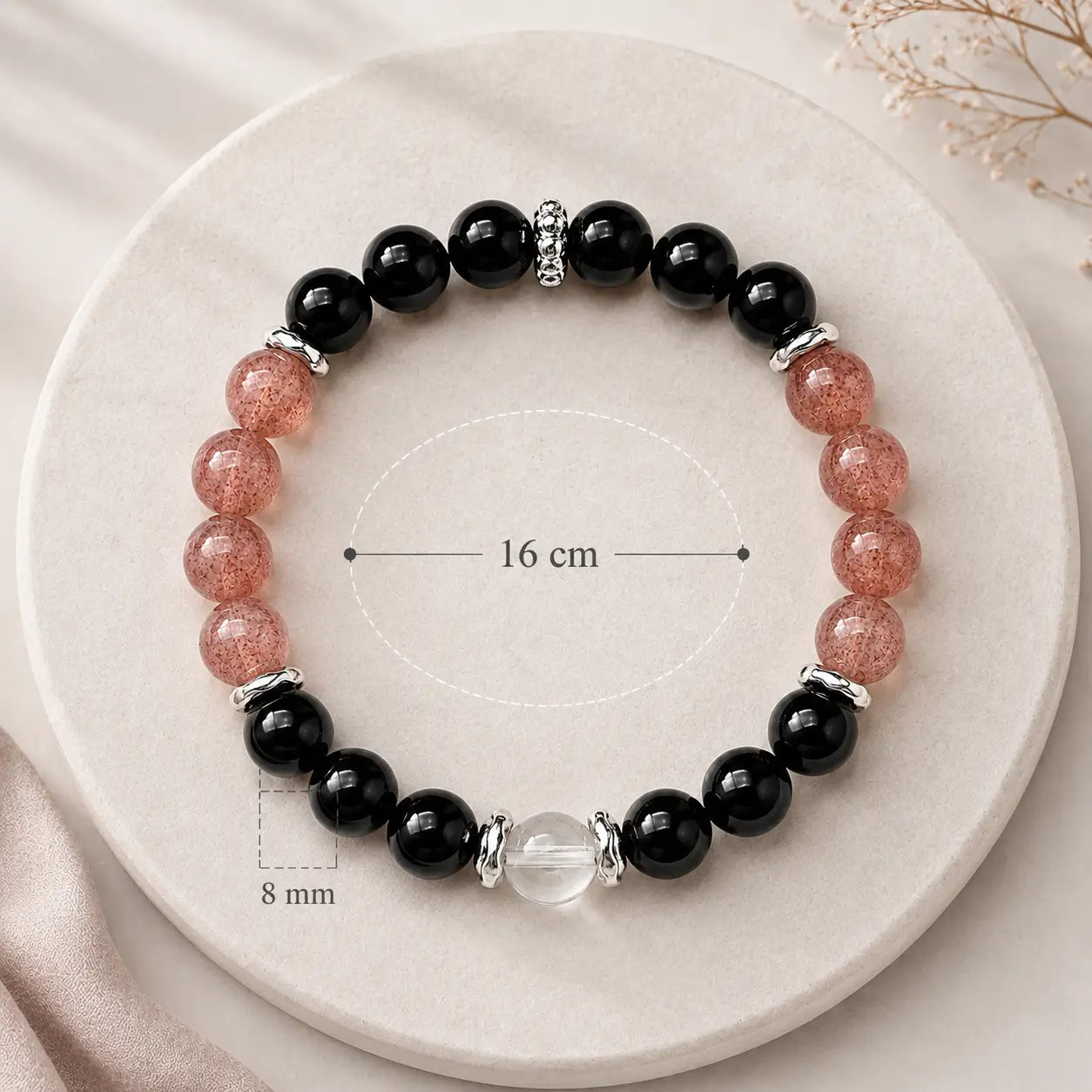 AURA Amulet obsidian and strawberry quartz bracelet size guide with 8mm beads and 16cm loop.
