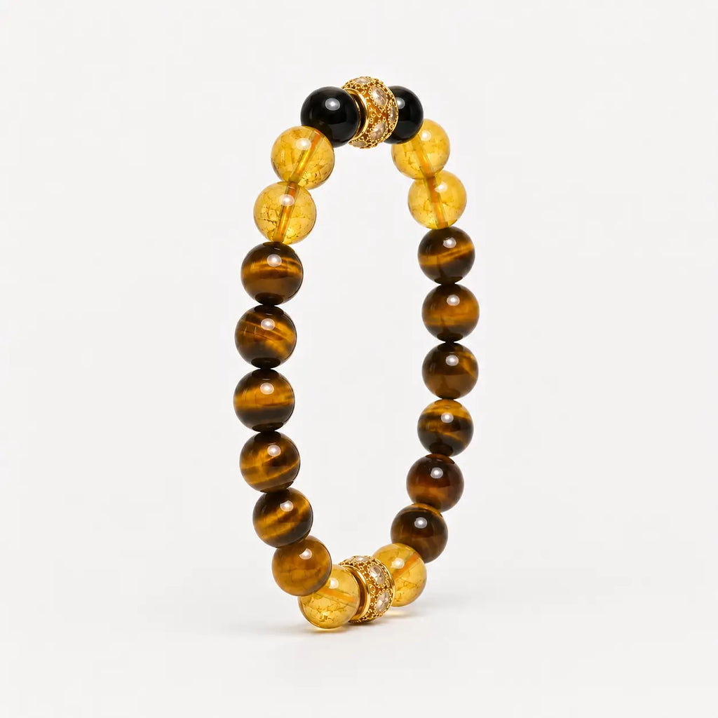 AURA Amulet angled tiger eye stone bracelet with citrine and obsidian, a golden healer bracelet for prosperity.