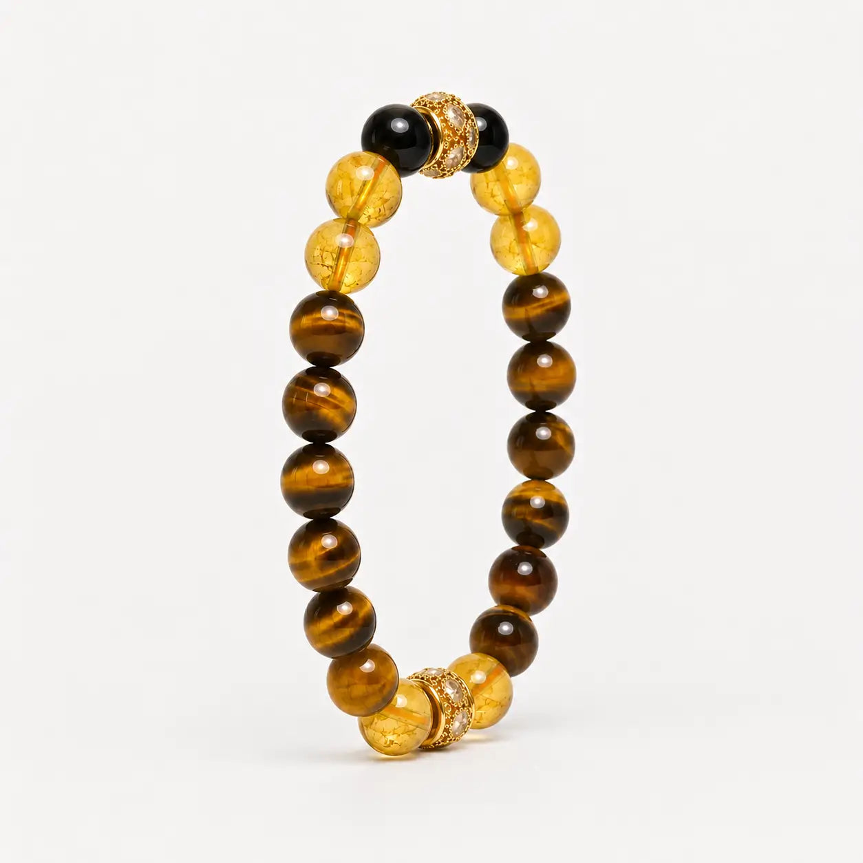 AURA Amulet angled tiger eye stone bracelet with citrine and obsidian, a golden healer bracelet for prosperity.